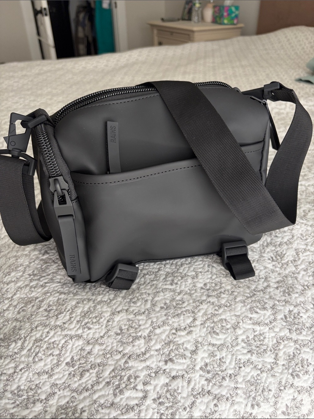 Rains black belt bag with matte finish